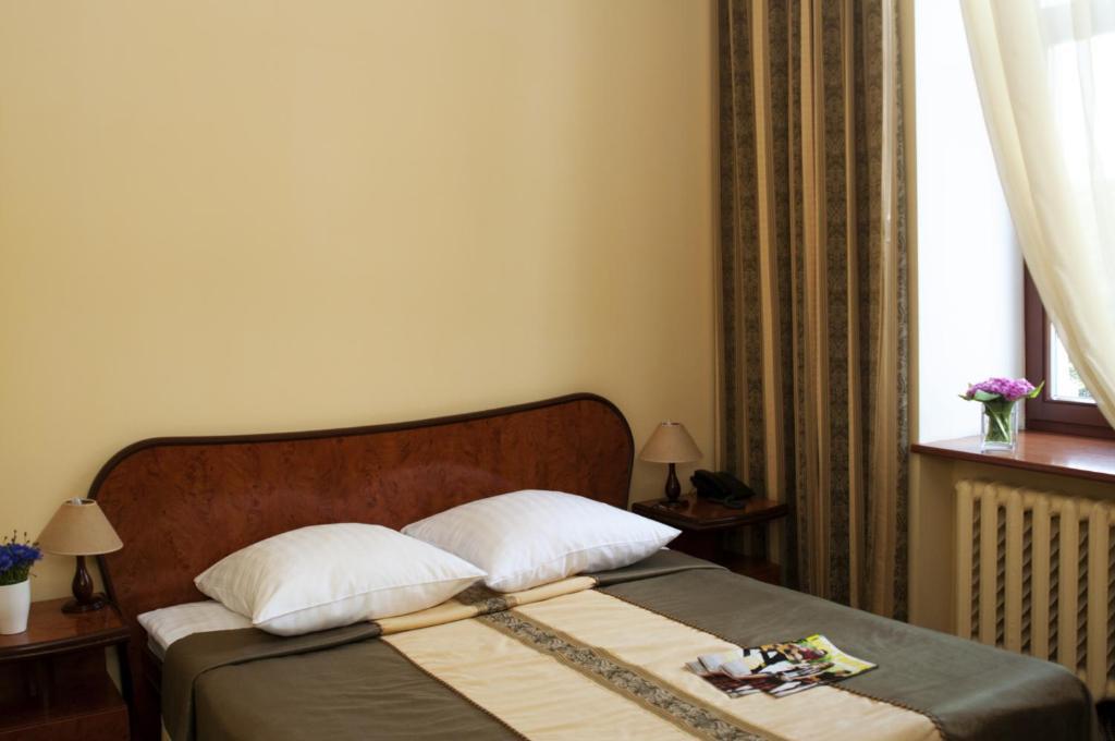 Wien Hotel Lviv Chambre photo