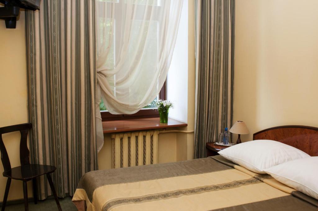 Wien Hotel Lviv Chambre photo