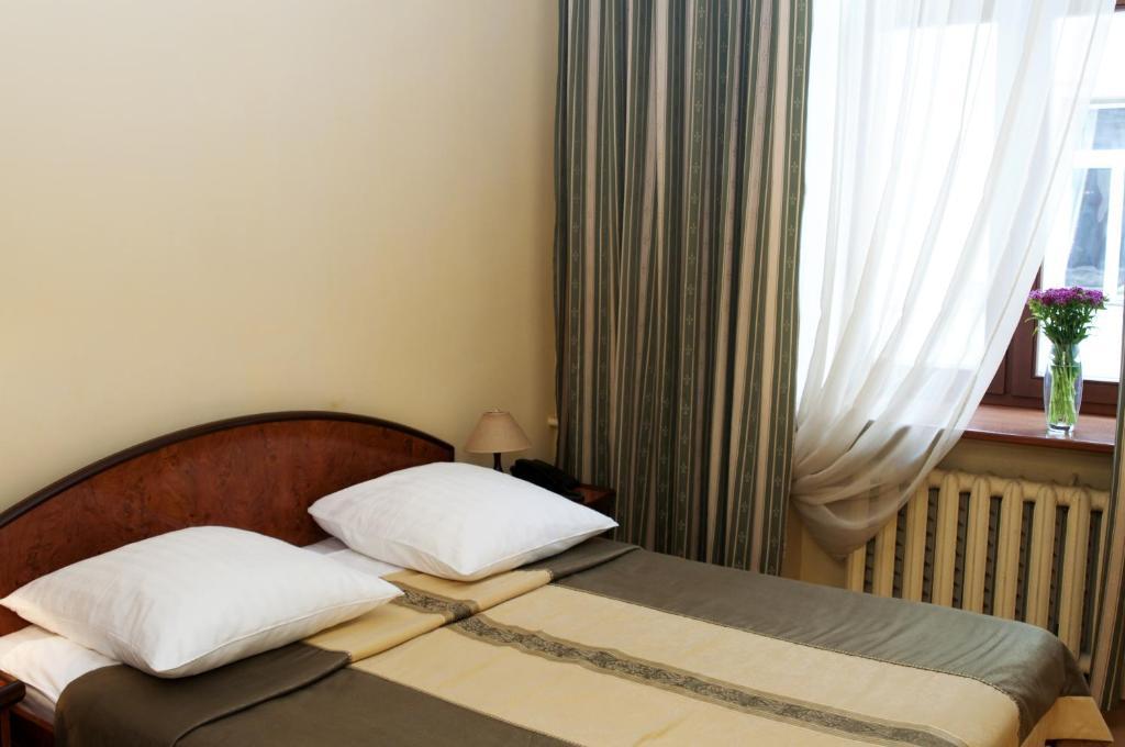 Wien Hotel Lviv Chambre photo