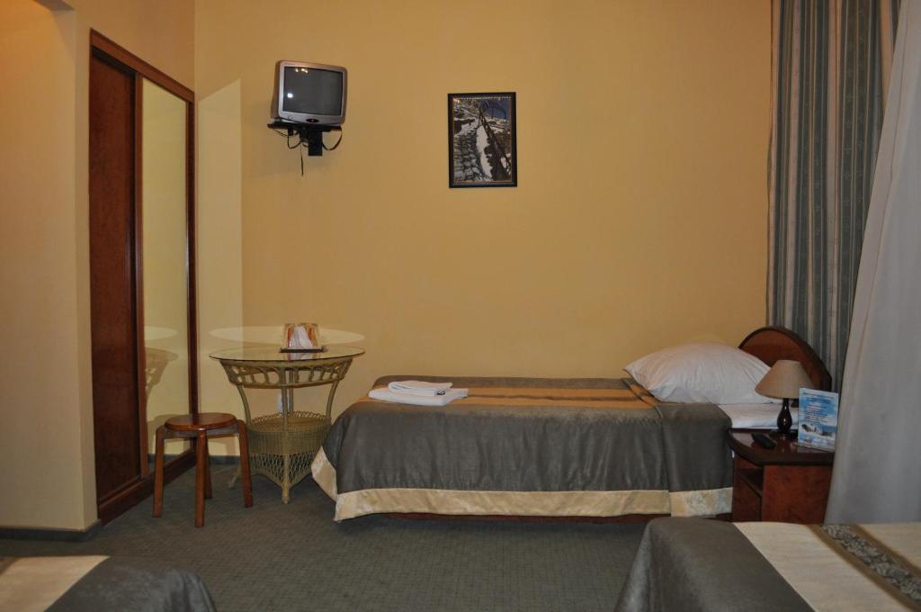 Wien Hotel Lviv Chambre photo