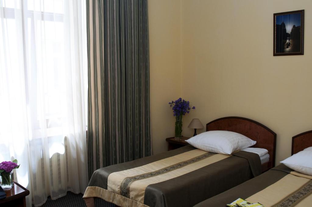 Wien Hotel Lviv Chambre photo