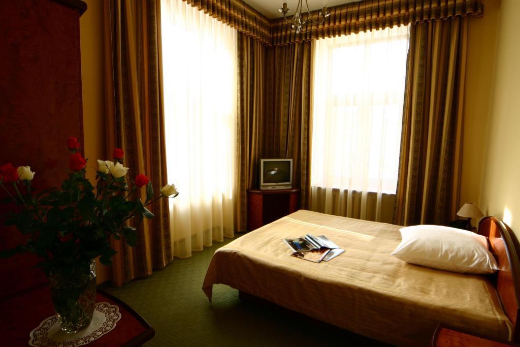 Wien Hotel Lviv Chambre photo