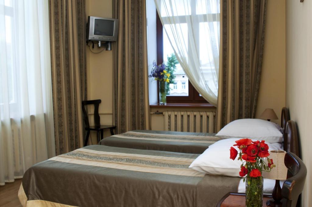 Wien Hotel Lviv Chambre photo