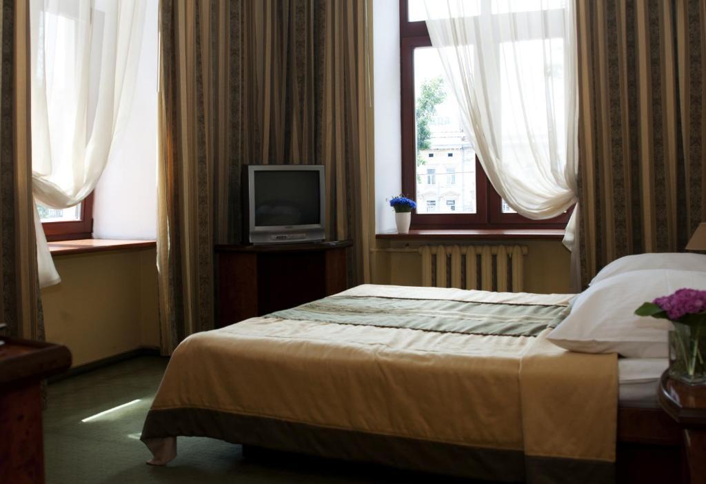 Wien Hotel Lviv Chambre photo