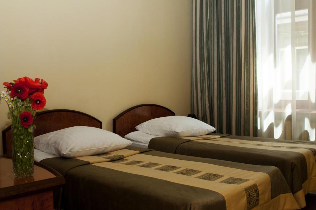 Wien Hotel Lviv Chambre photo