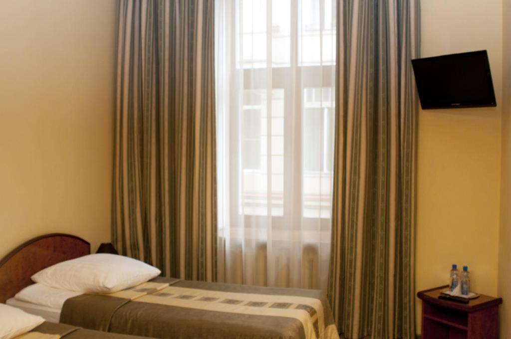 Wien Hotel Lviv Chambre photo