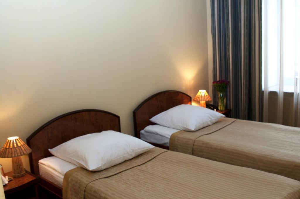 Wien Hotel Lviv Chambre photo