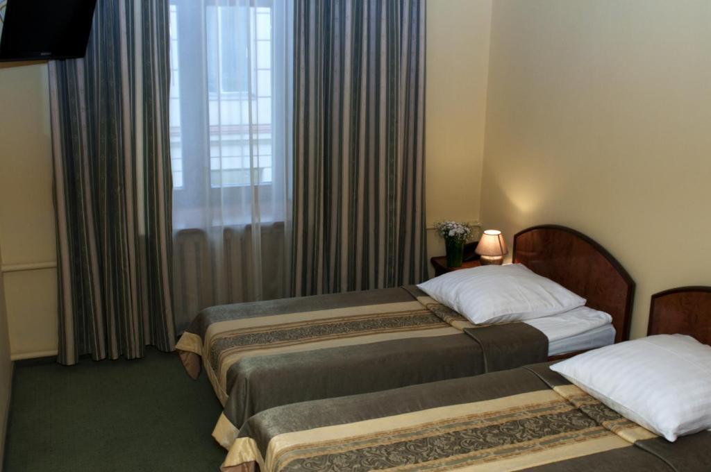 Wien Hotel Lviv Chambre photo